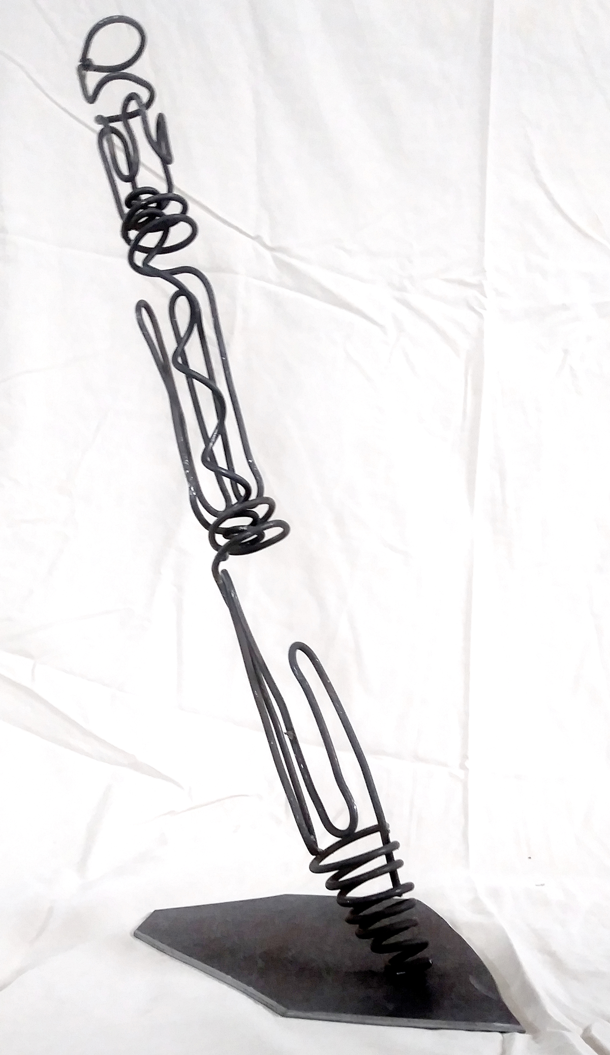 steel sculpture of a pencil by Ada Denil