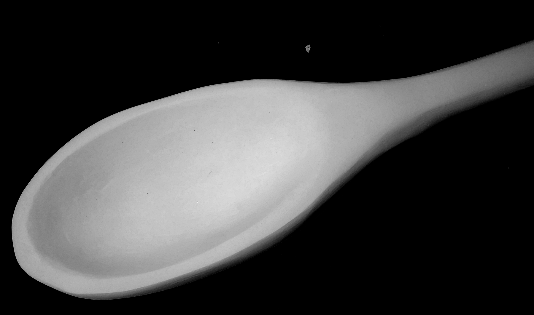 plaster carving of a carved wooden spoon