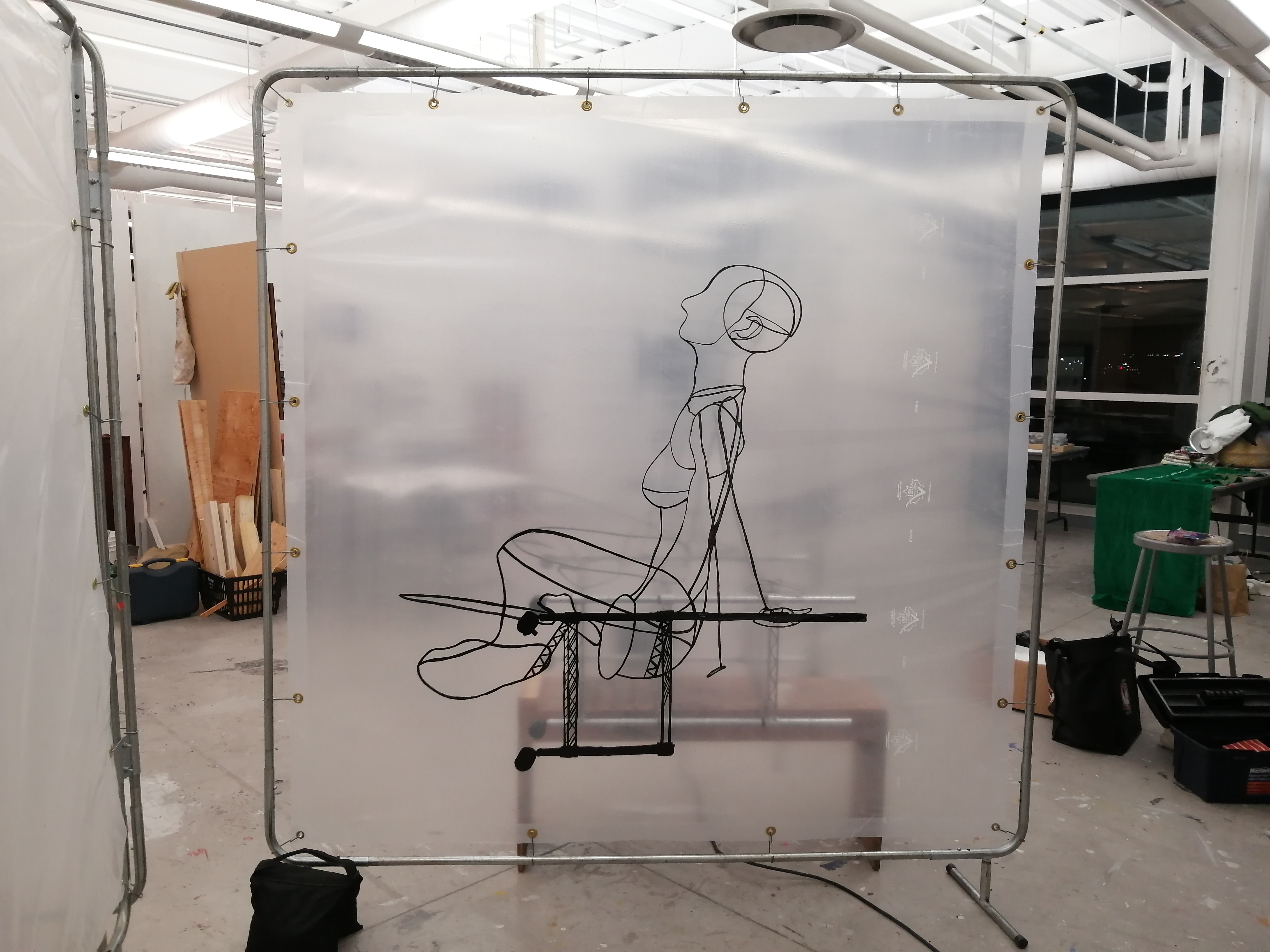 an artwork by Ada Denil consisting of translucent welding screens with line drawings