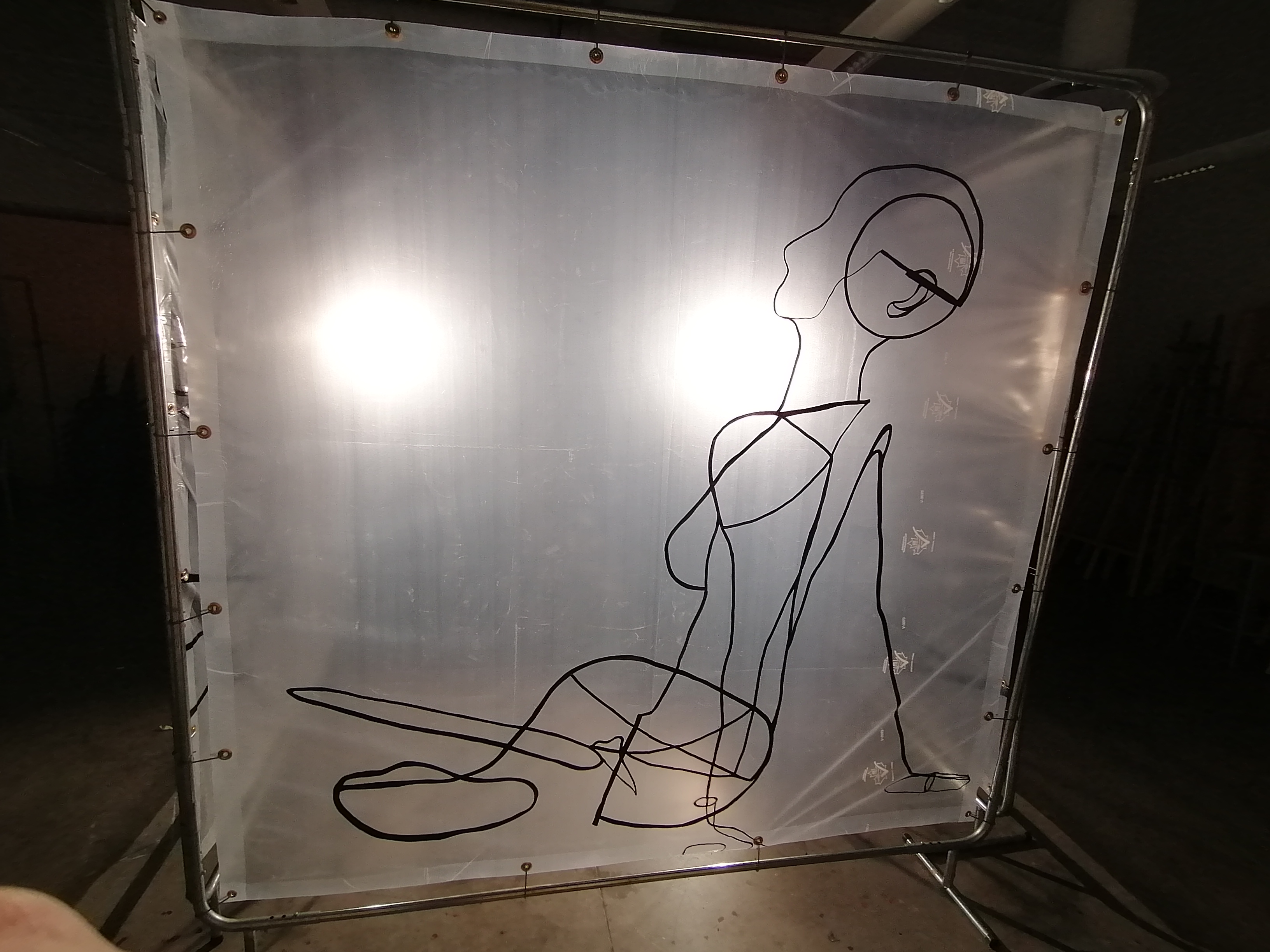 an artwork by Ada Denil consisting of translucent welding screens with line drawings