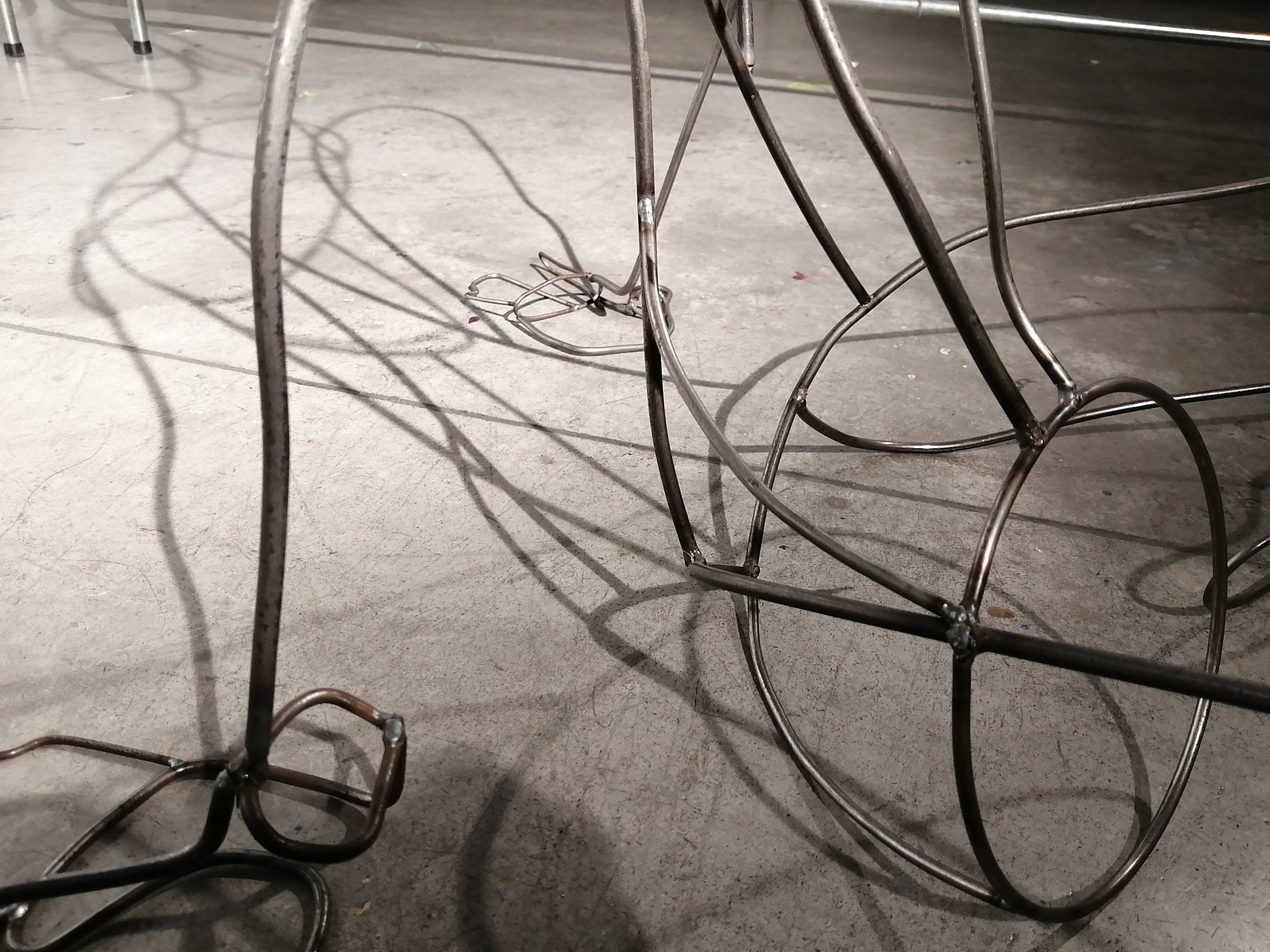 a steel figure constructed with steel rods created by Ada Denil