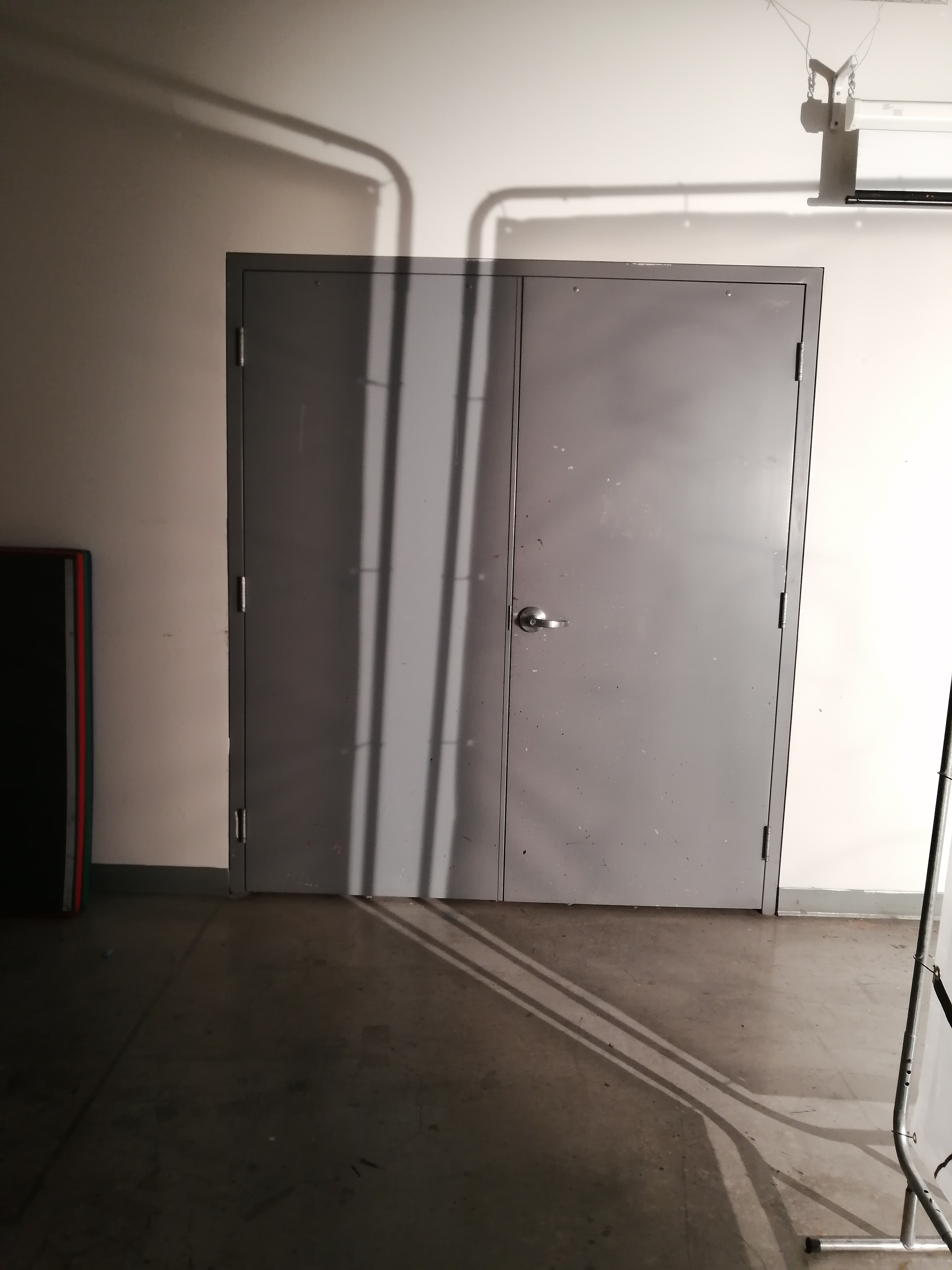 an artwork by Ada Denil consisting of translucent welding screens with line drawings