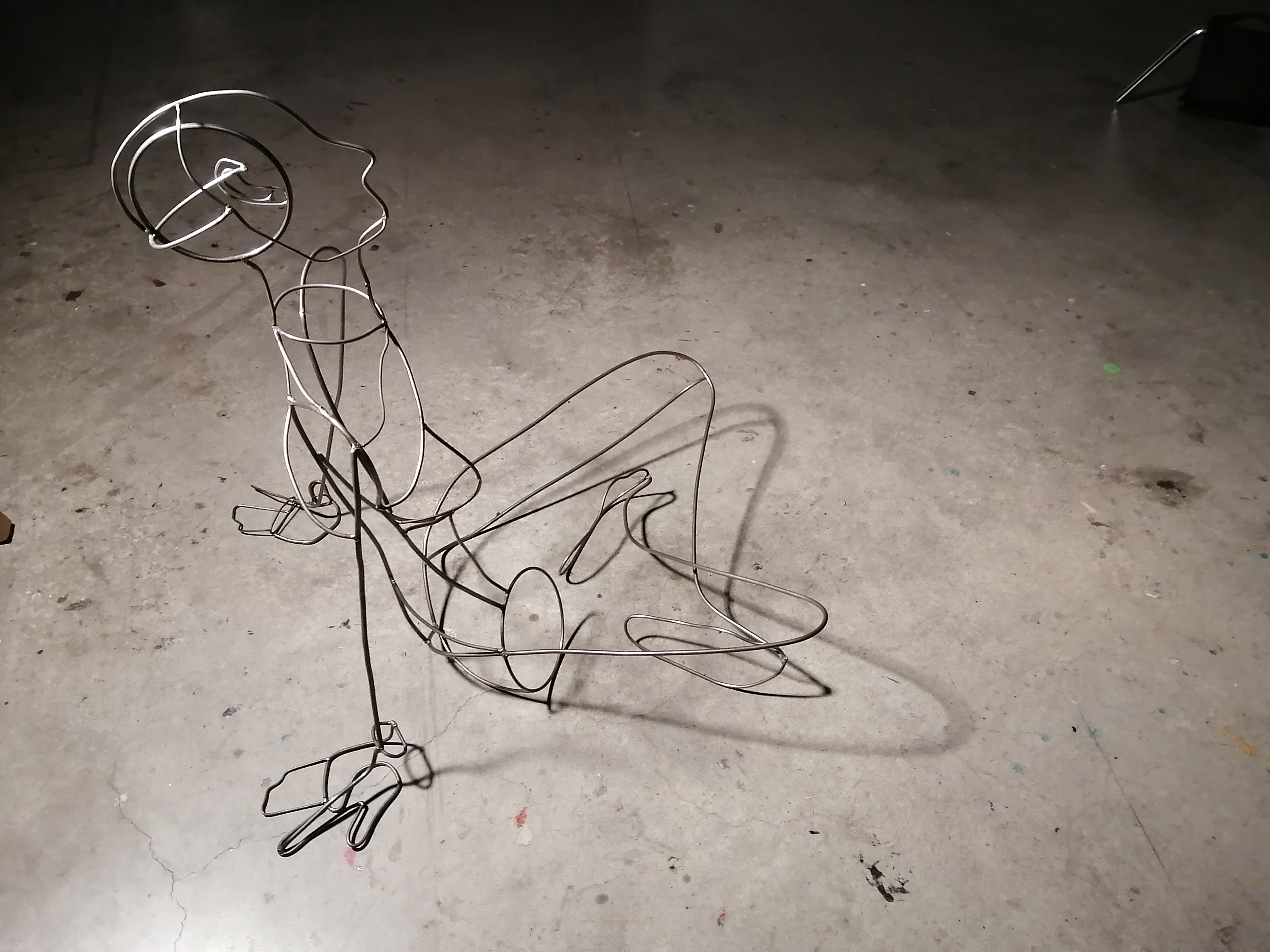 a steel figure constructed with steel rods created by Ada Denil