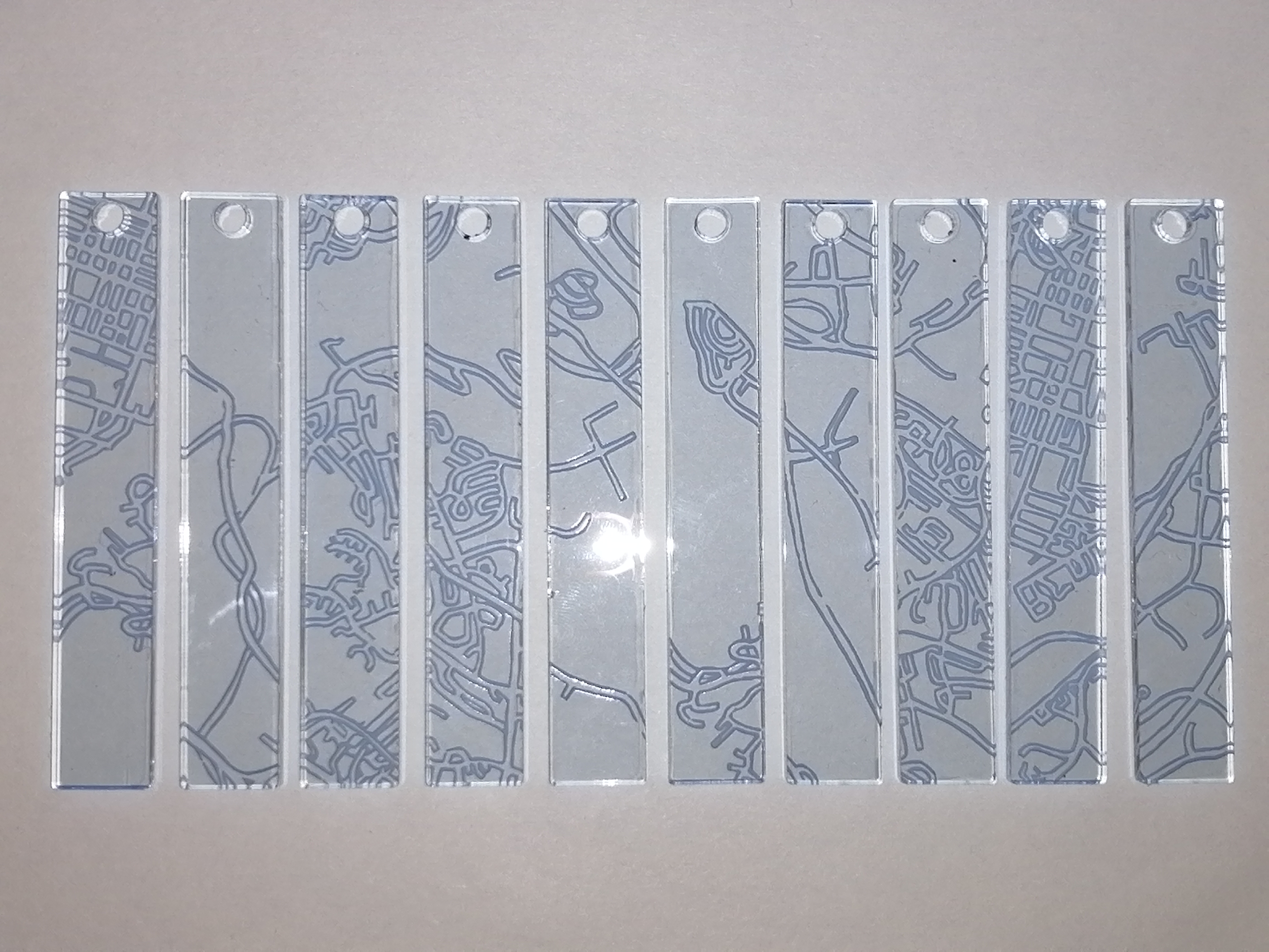 acrylic pendants engraved with a hand drawn map of Halifax NS