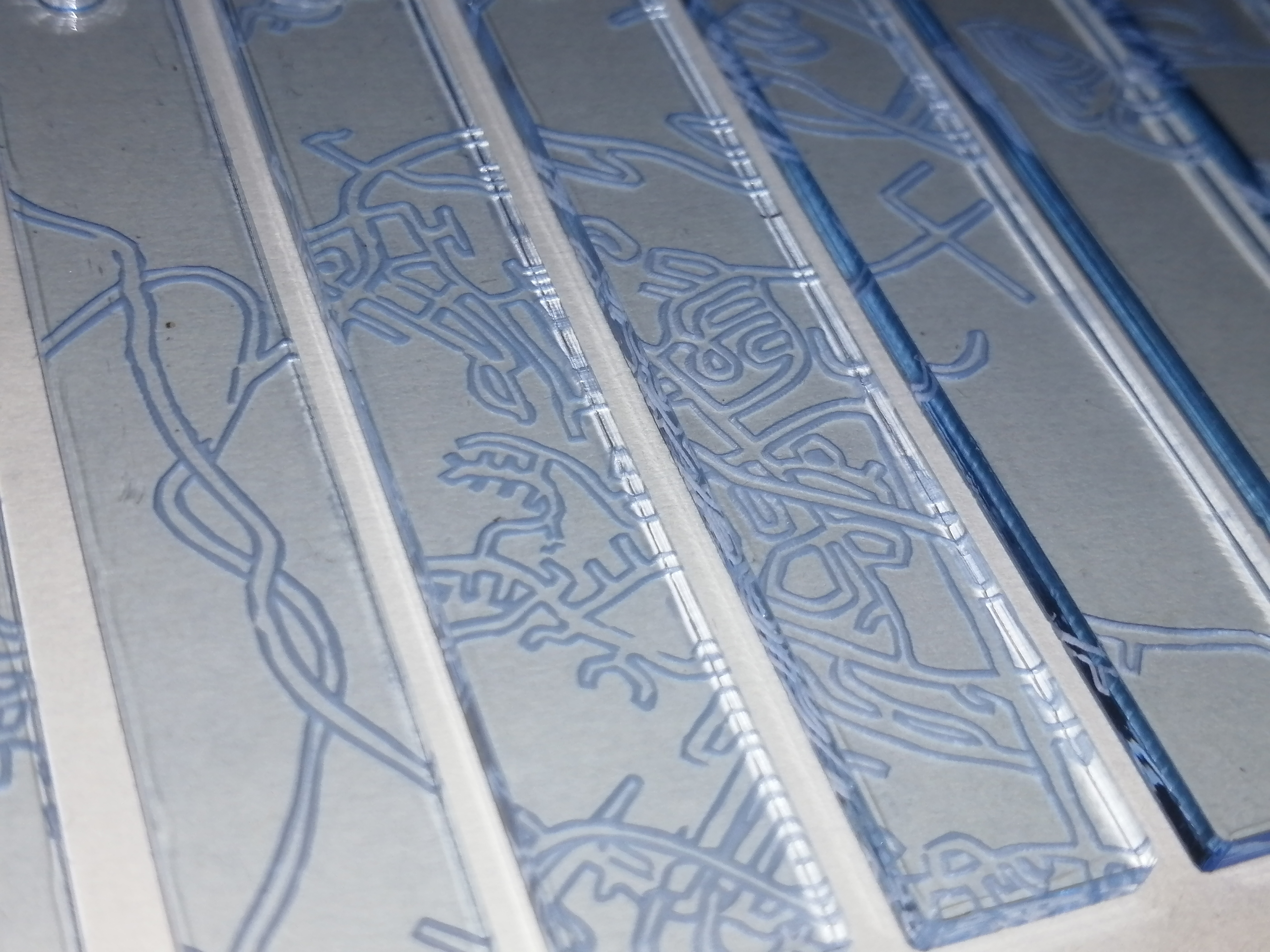 acrylic pendants engraved with a hand drawn map of Halifax NS