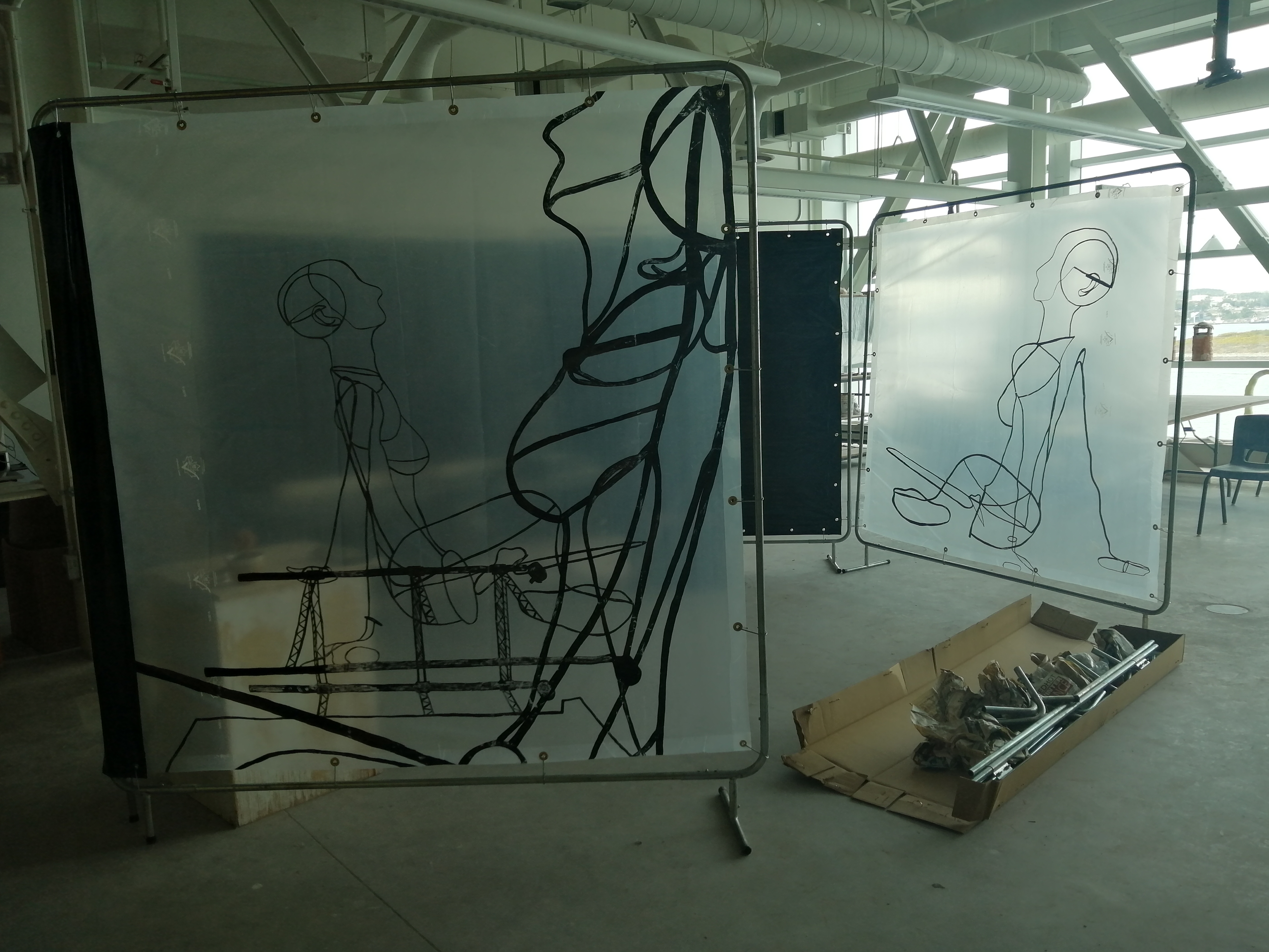 Translucent screens creating a studio space made by Ada Denil 