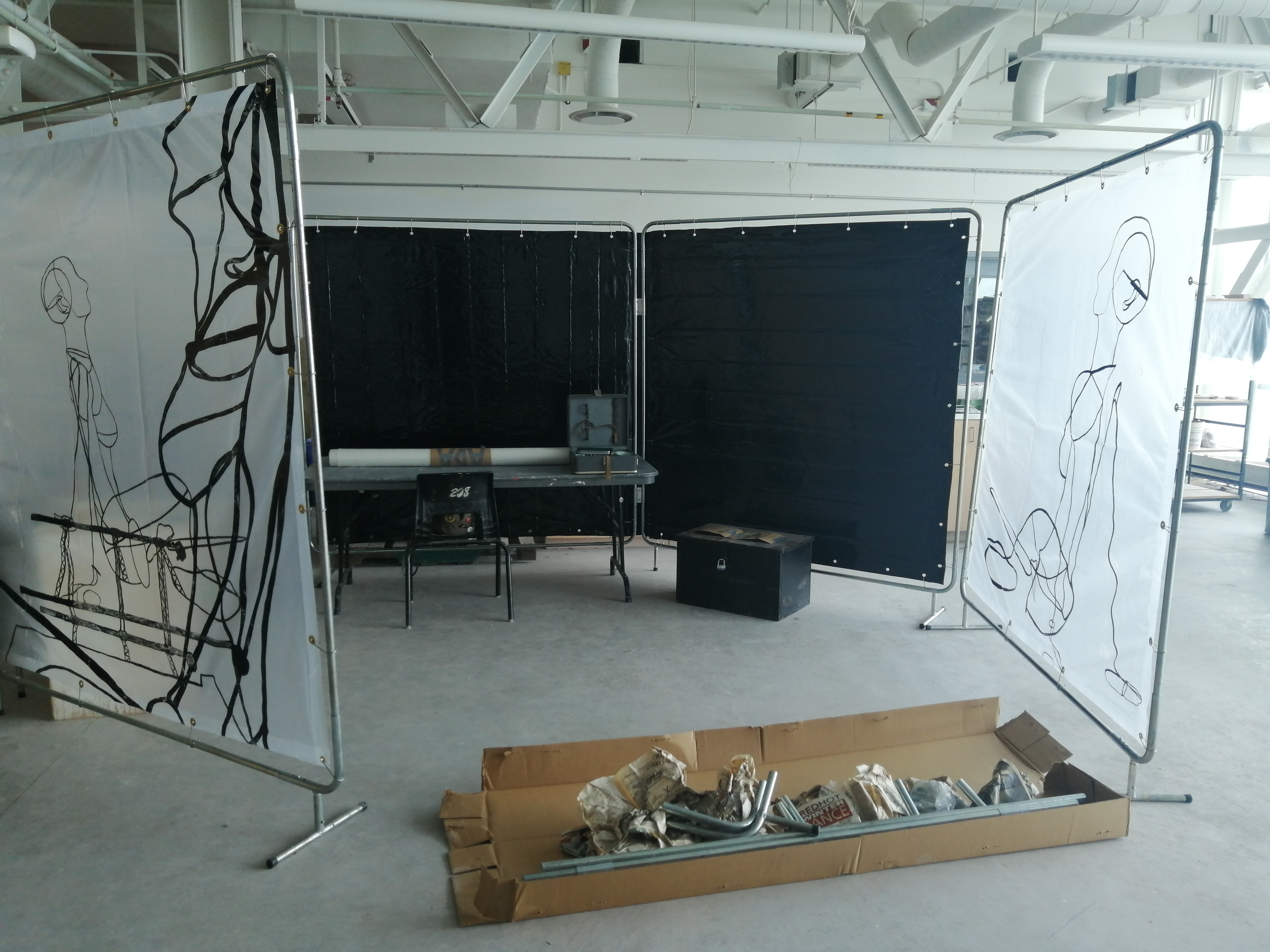 Translucent screens creating a studio space made by Ada Denil 